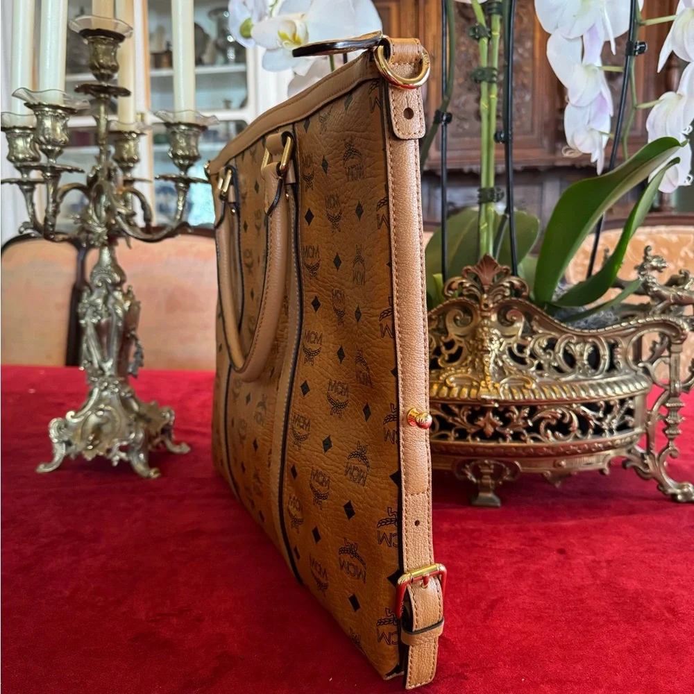 💯 Guaranteed Authentic MCM Cognac Visetos Laptop Bag with strap🥀🥀PRICE IS FIRM🥀🥀